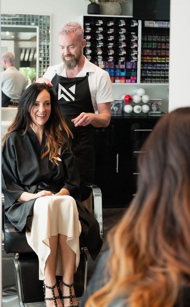 Stylist consultation at Murraki Salon highlighting the personalized guest experience and mentorship behind Boise salon careers.